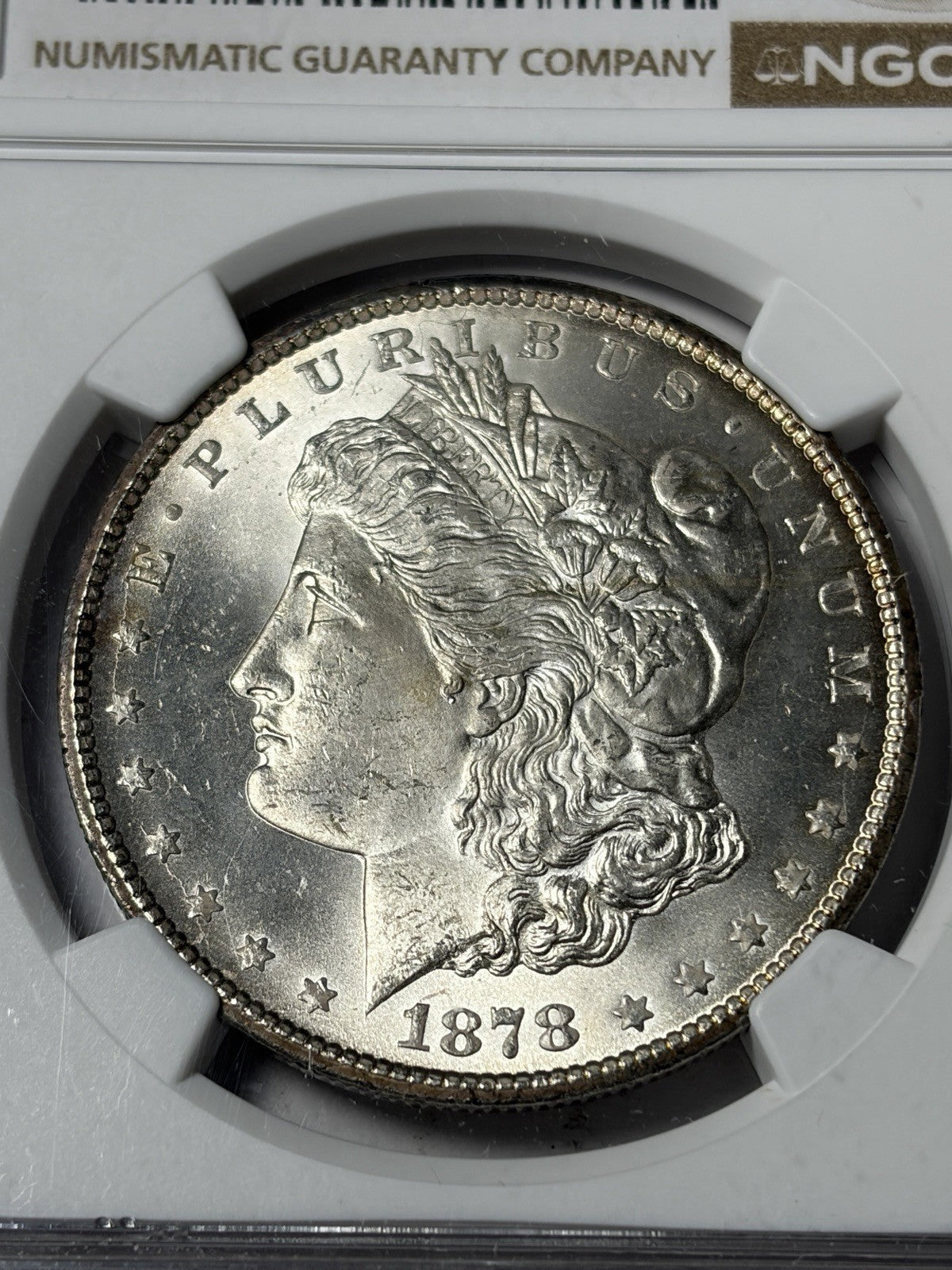 1878-CC NGC MS65 Morgan Dollar