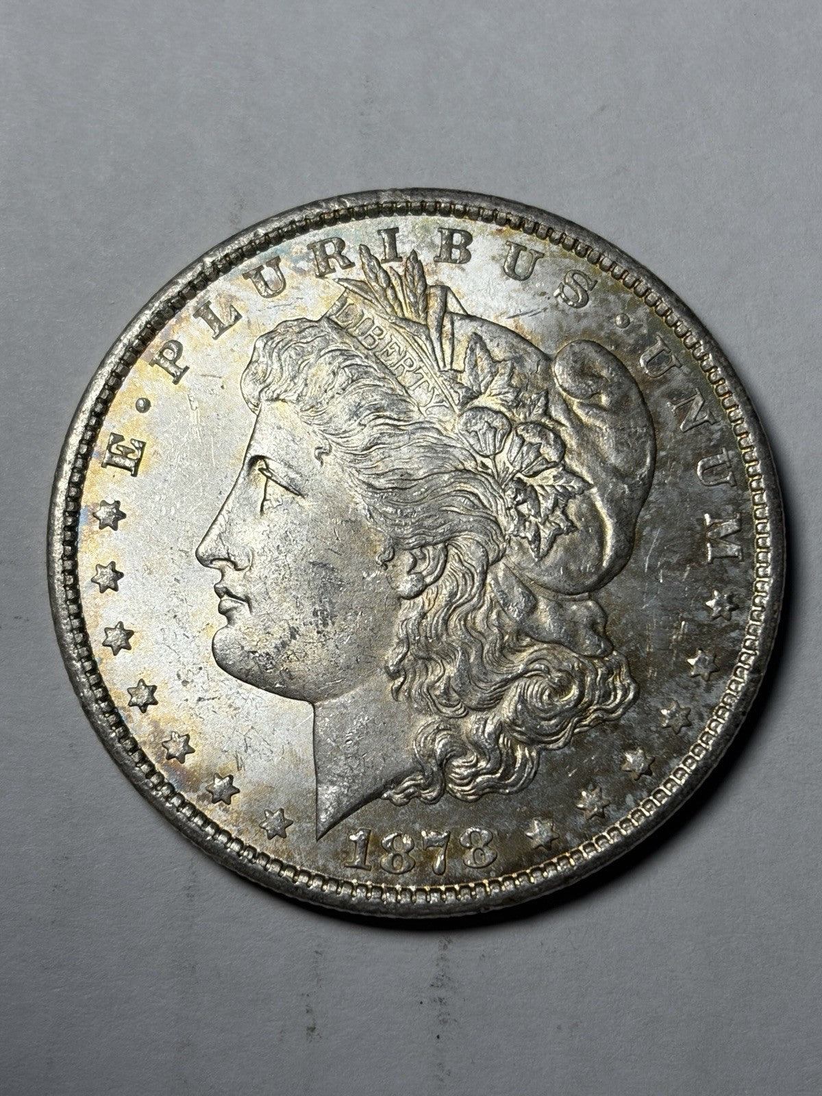 1878-CC Morgan Silver Dollar Uncirculated Toned