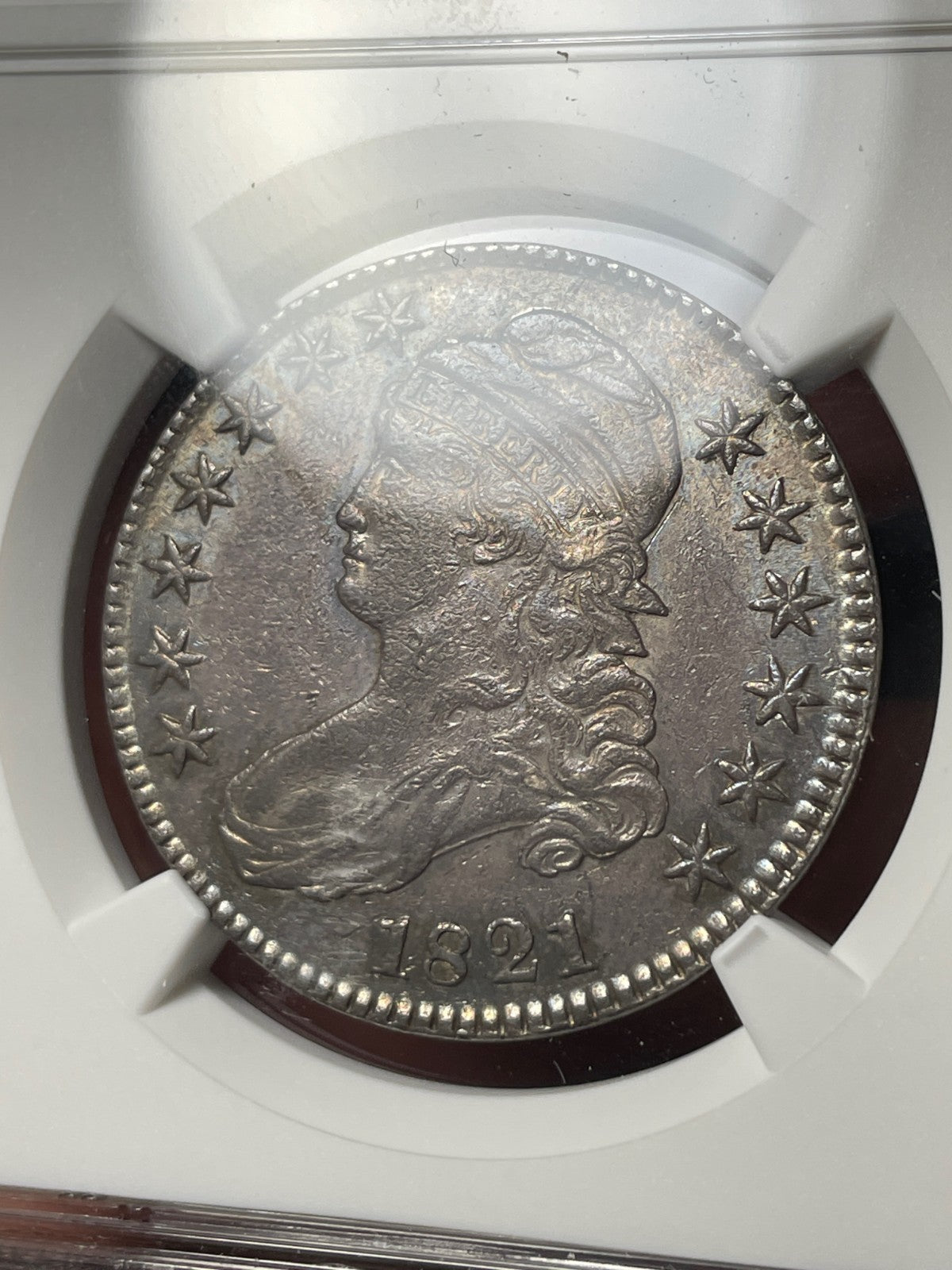1821 NGC AU Details Capped Bust Half Dollar Toned