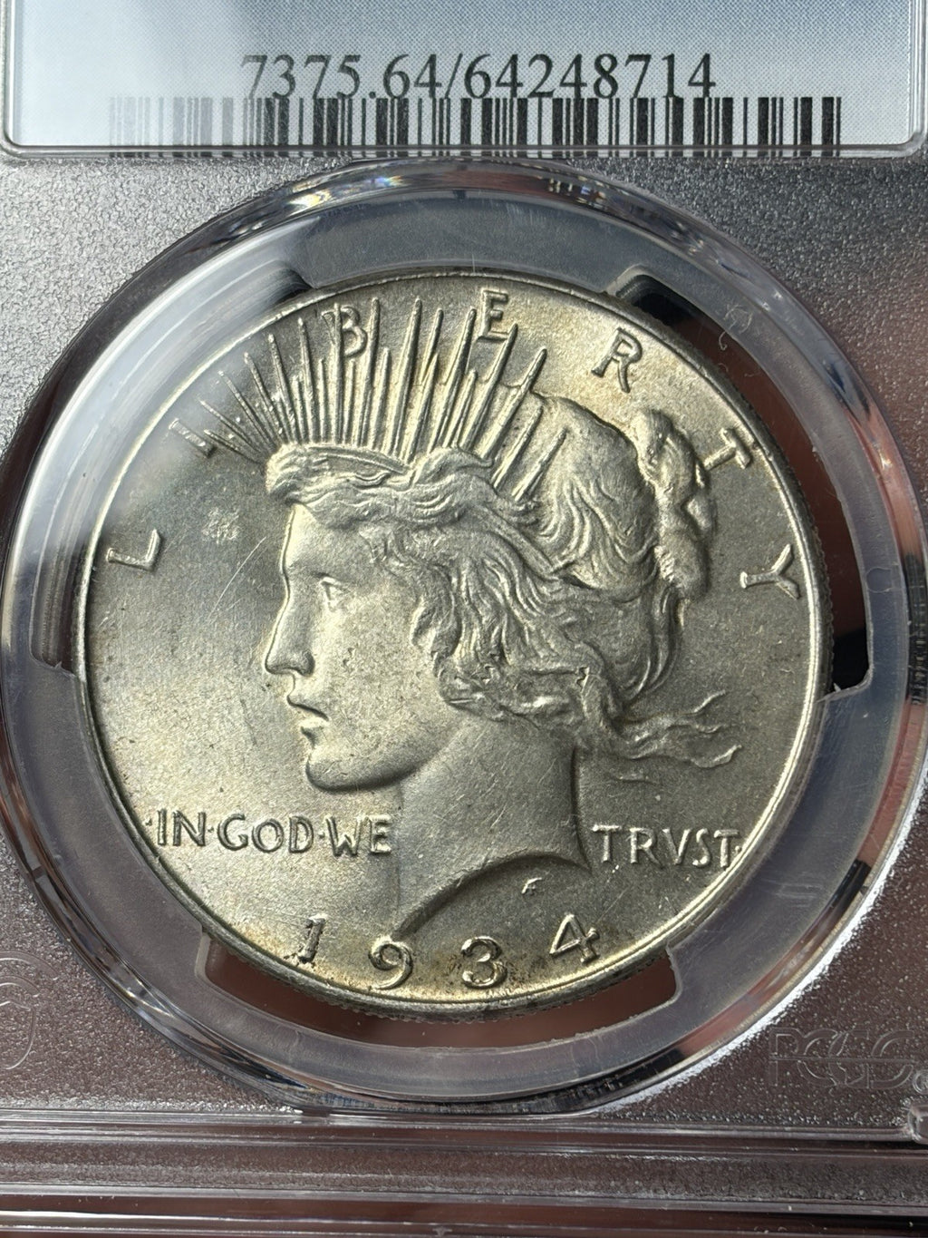 1934 PCGS MS64 Peace Silver Dollar Lightly Toned