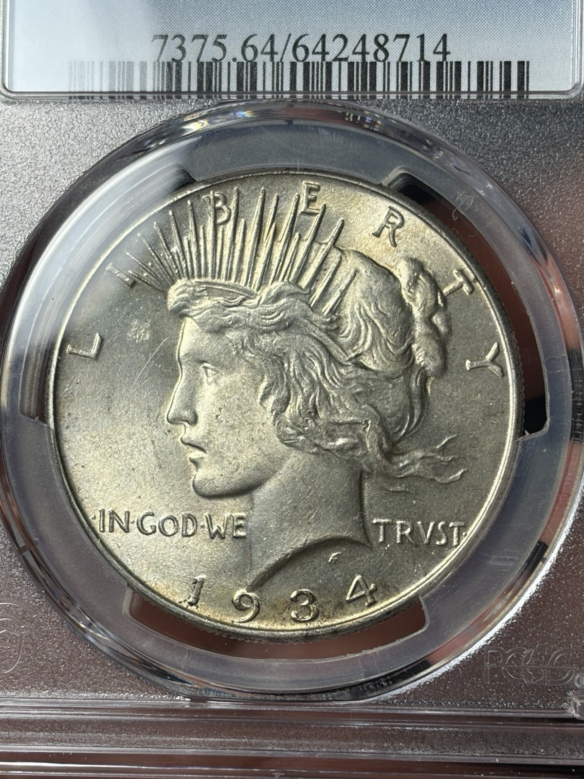 1934 PCGS MS64 Peace Silver Dollar Lightly Toned