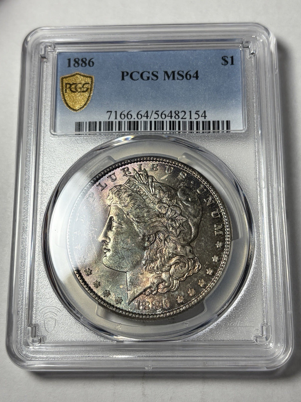 1886 PCGS MS64 Morgan Silver Dollar Toned