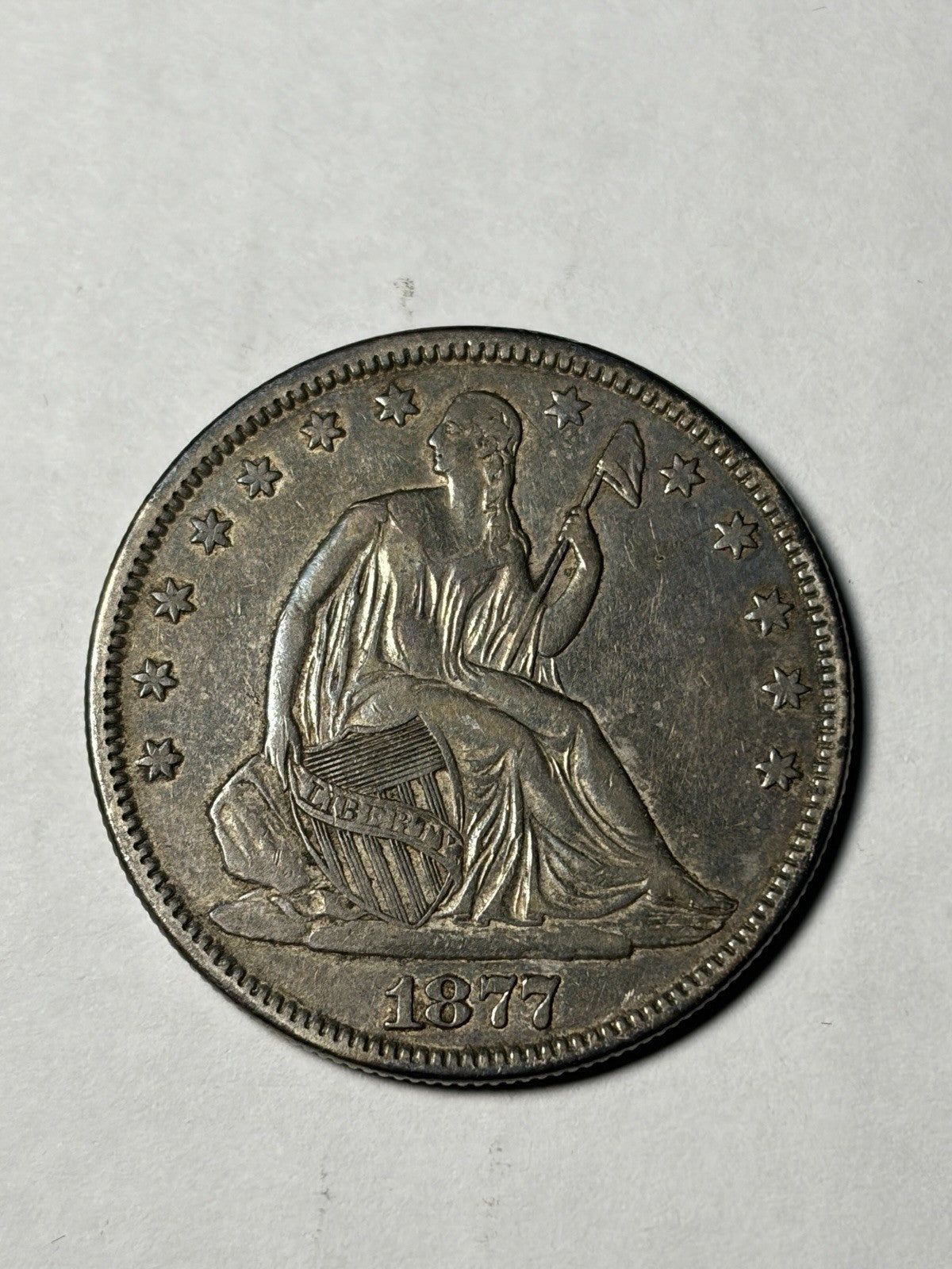 1877 Seated Liberty Half Dollar Toned