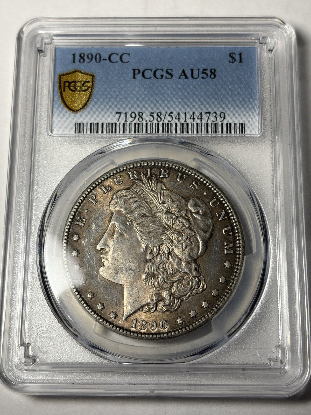1890-CC PCGS AU58 Morgan Silver Dollar Toned