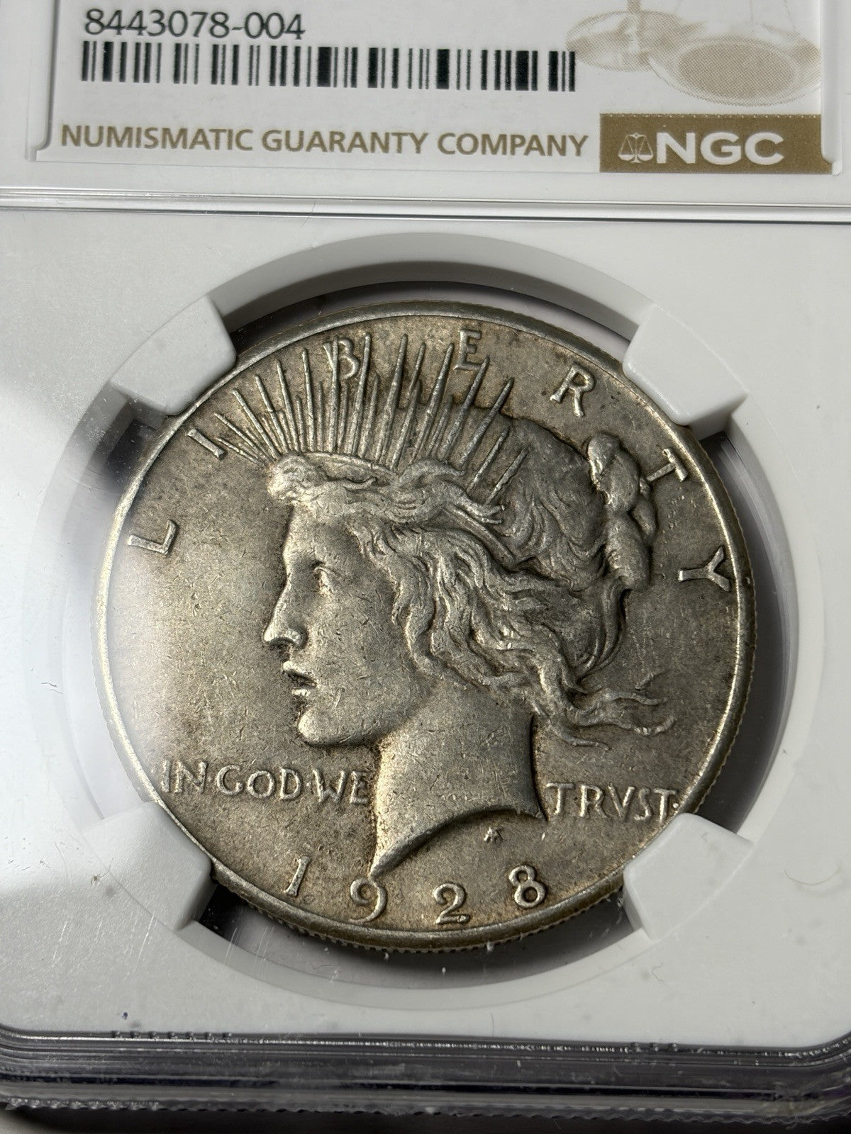 1928 NGC XF40 Peace Silver Dollar