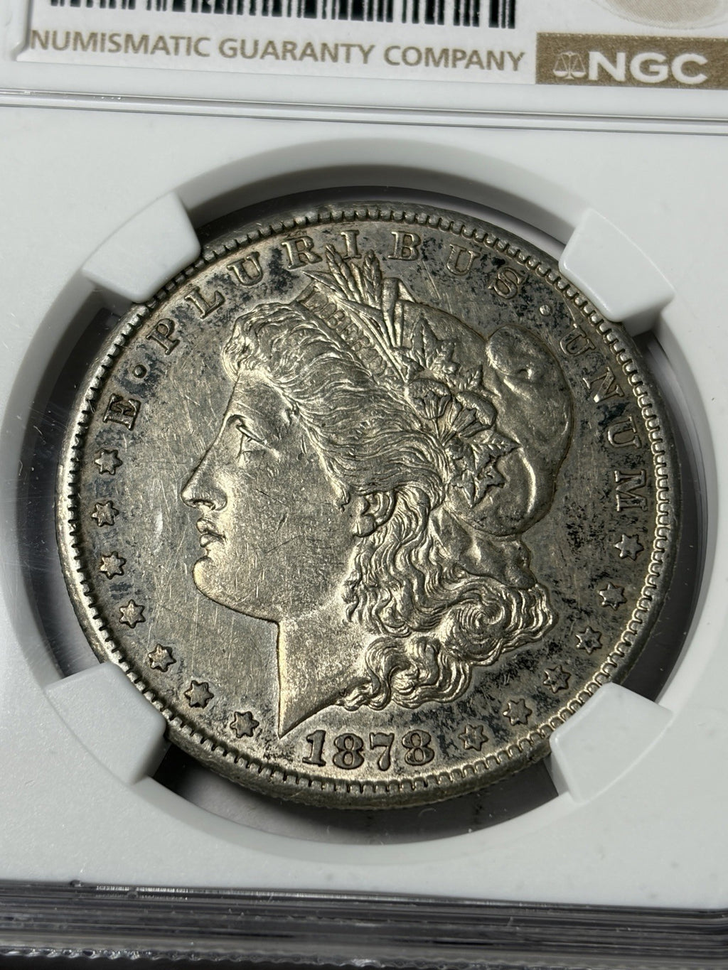 1878-CC NGC AU53 Morgan Silver Dollar