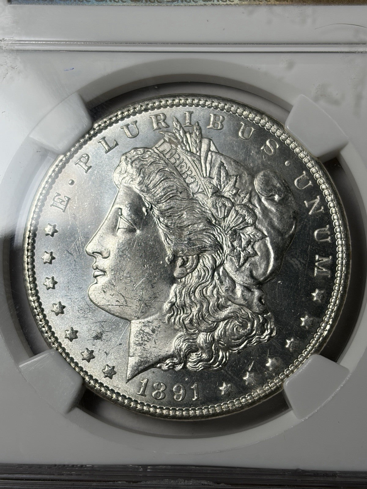 1891-CC NGC MS62 Morgan Silver Dollar