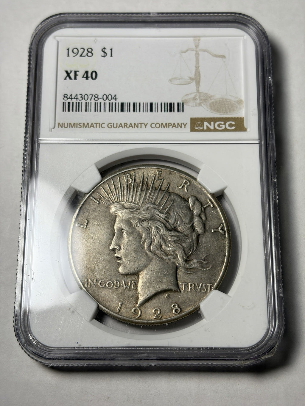 1928 NGC XF40 Peace Silver Dollar