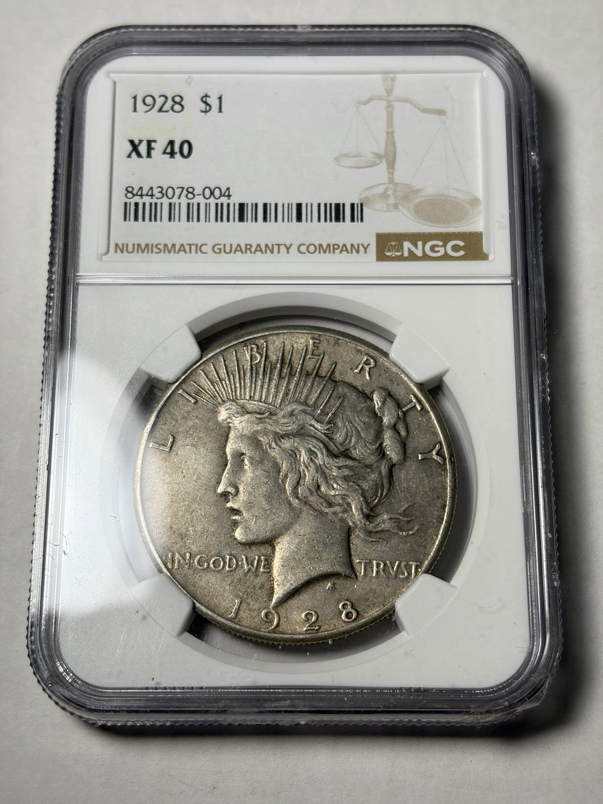 1928 NGC XF40 Peace Silver Dollar