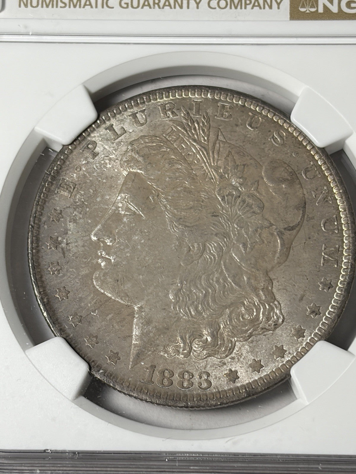 1883-O NGC MS64 Morgan Silver Dollar Toned