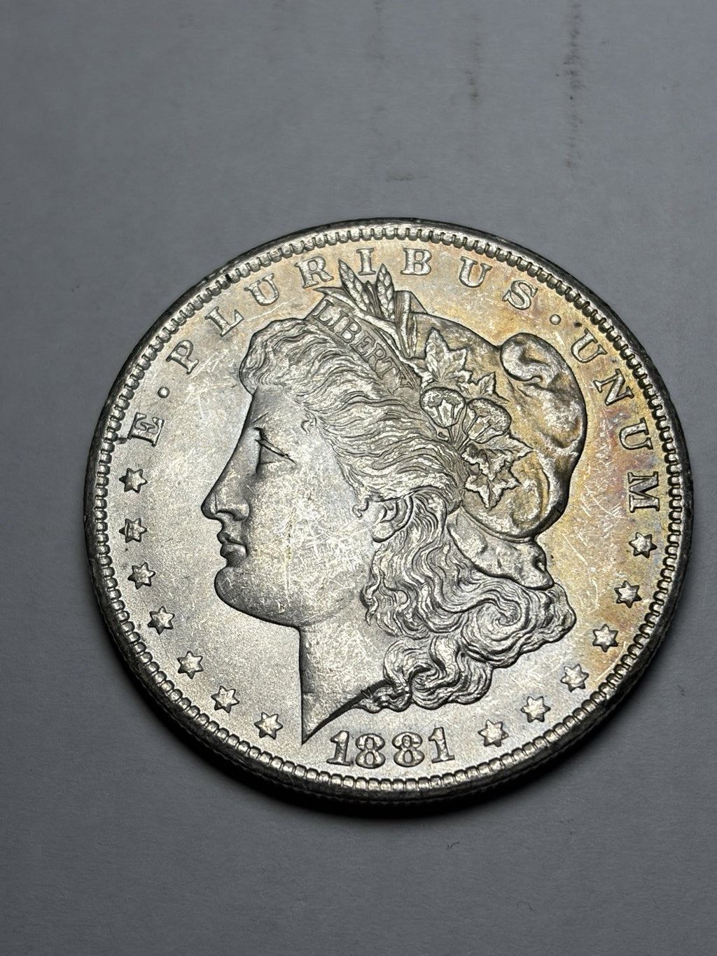 1881-CC Morgan Silver Dollar Uncirculated Toned