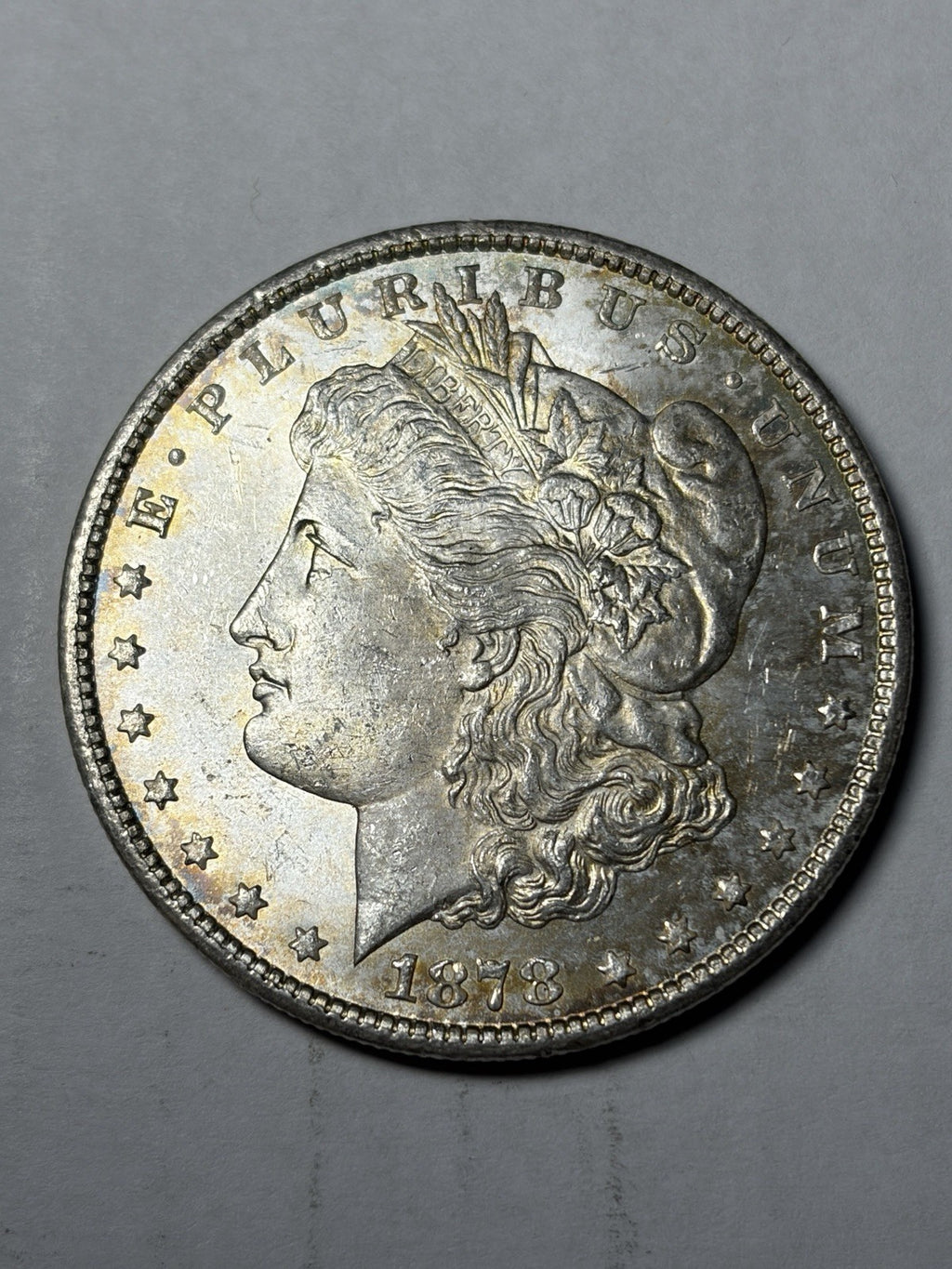 1878-CC Morgan Silver Dollar Uncirculated Toned