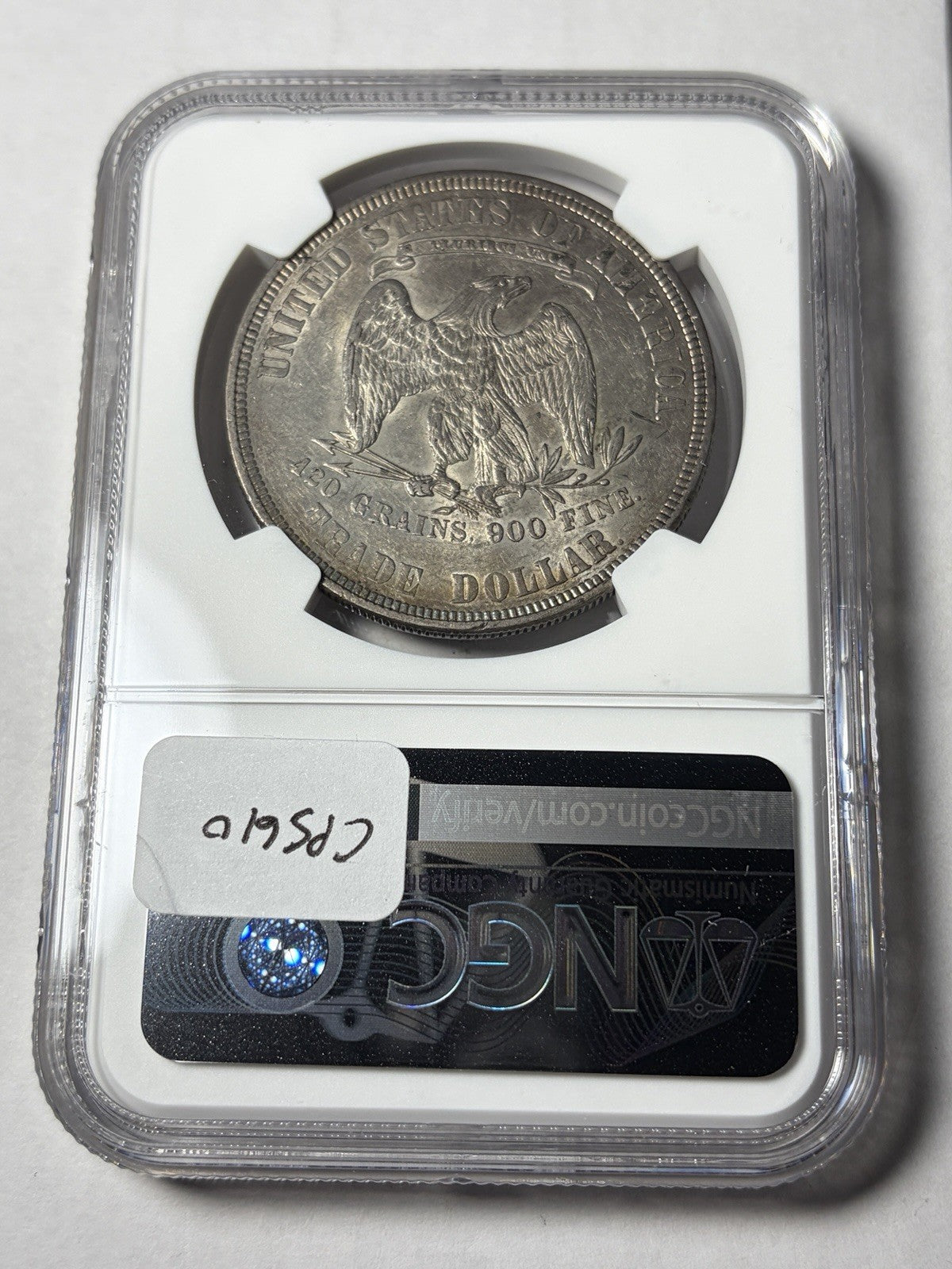 1877 NGC AU55 Trade Silver Dollar Toned
