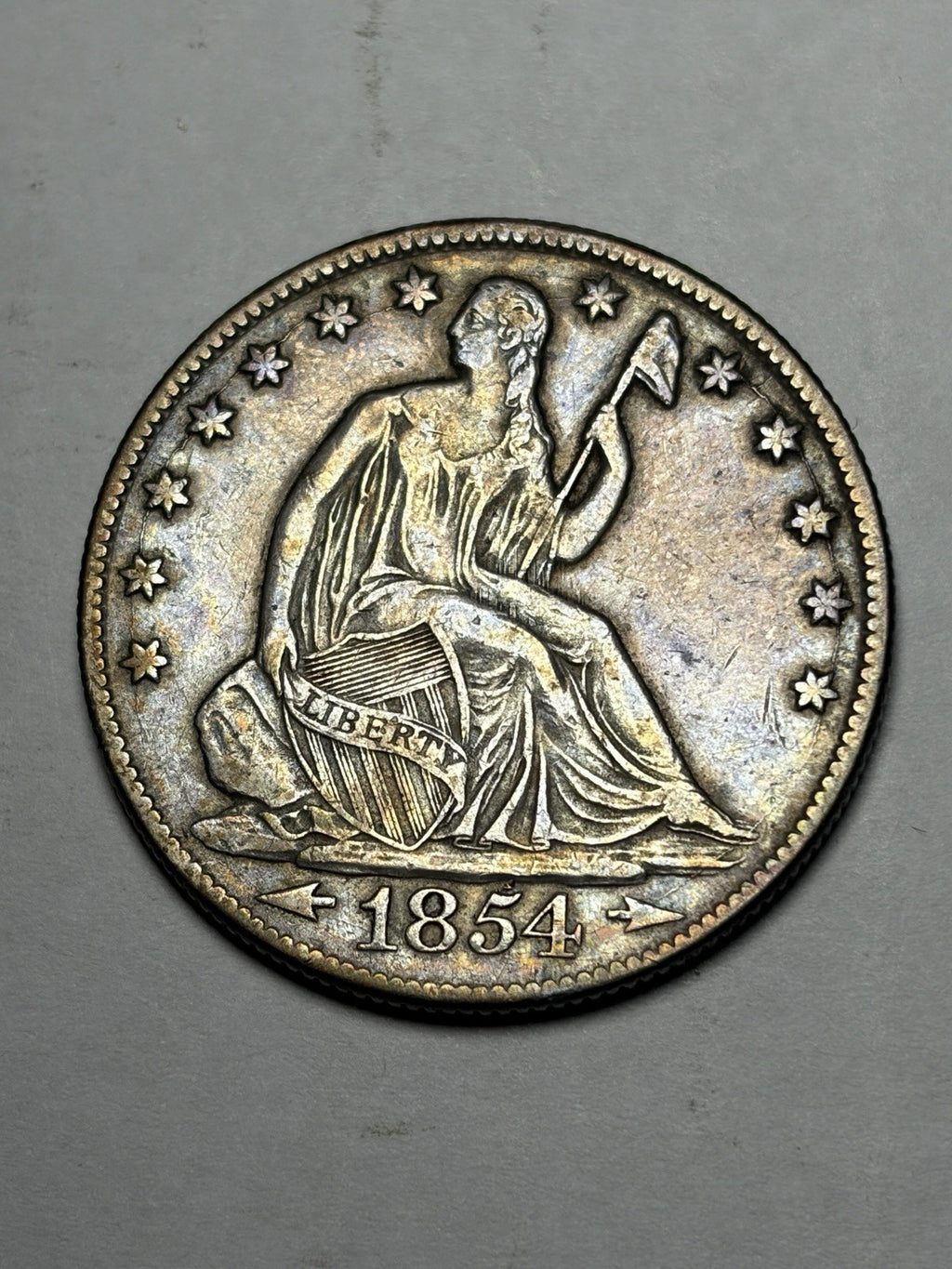 1854-O With Arrows Seated Liberty Half Dollar Toned