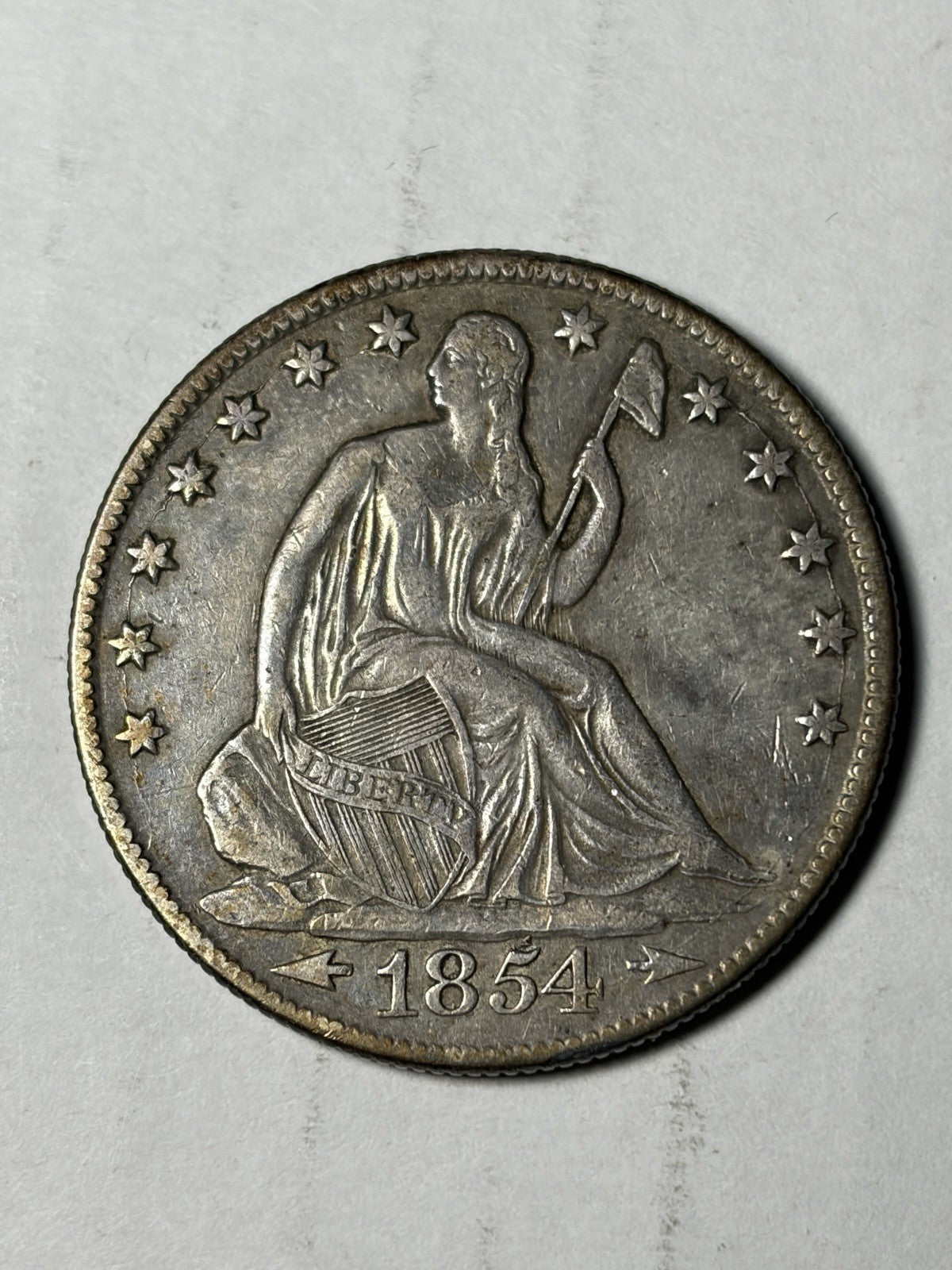 1854-O With Arrows Seated Liberty Half Dollar Toned