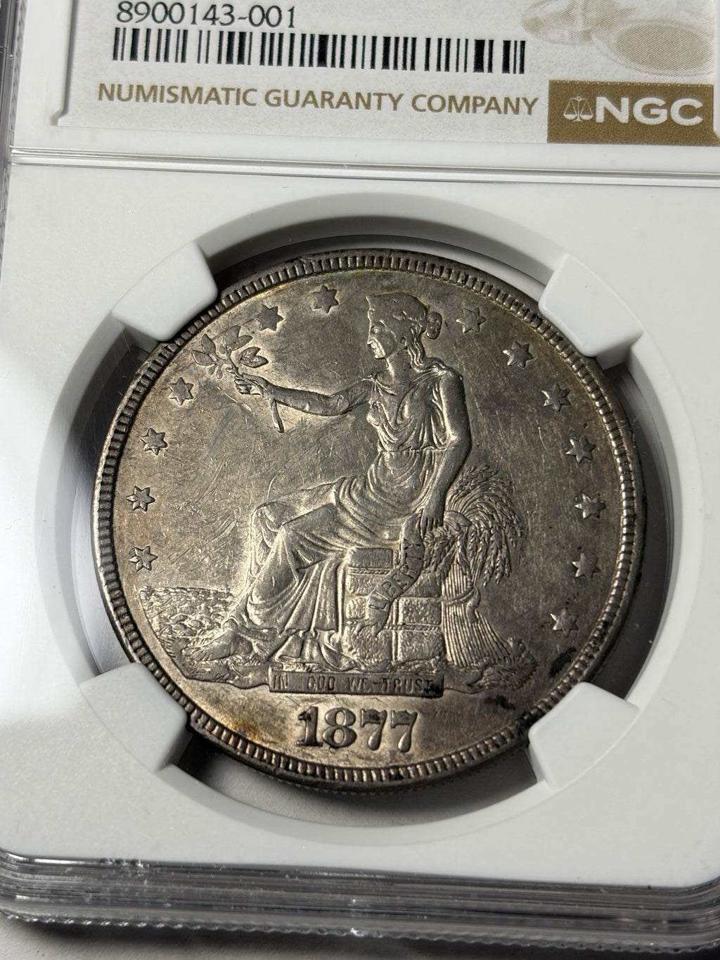 1877 NGC AU55 Trade Silver Dollar Toned