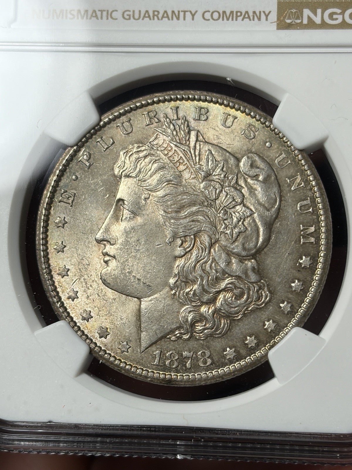 1878-CC NGC MS61 Morgan Silver Dollar Reverse Toned