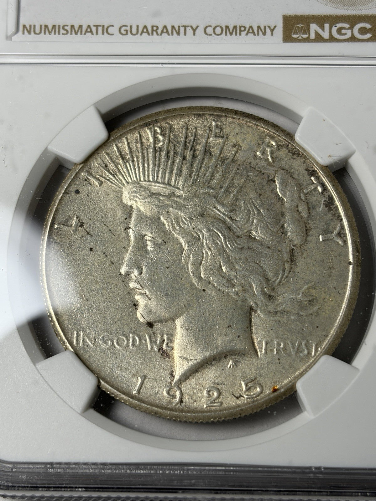 1925-S NGC UNC Details Peace Silver Dollar