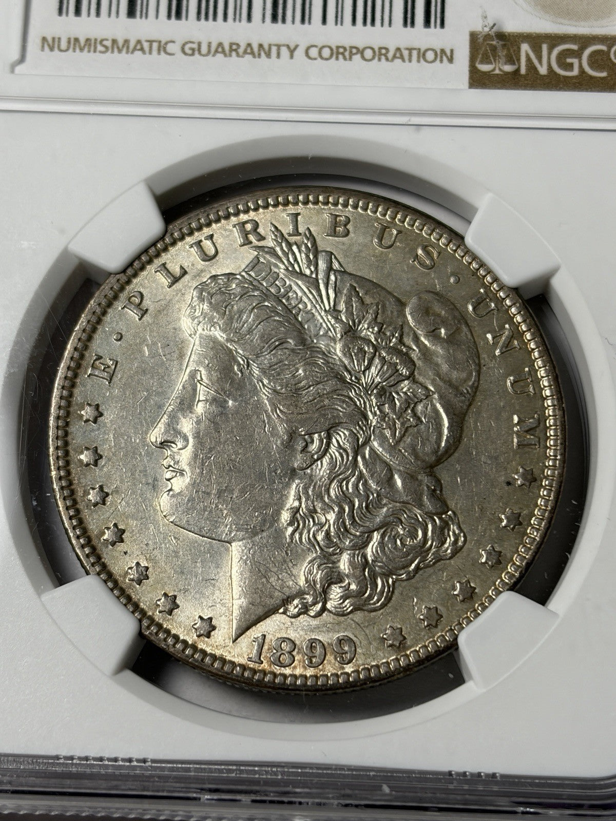 1899-O Micro O NGC AU55 Morgan Silver Dollar TOP-100
