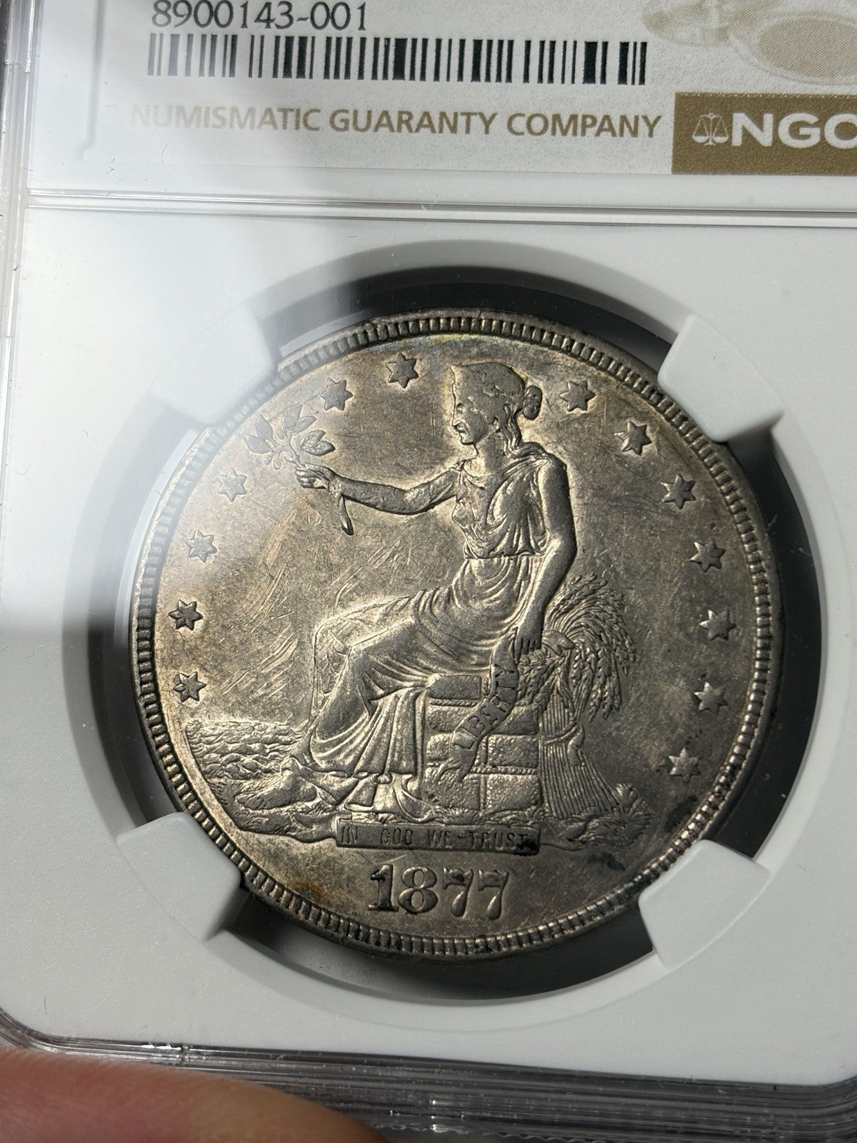 1877 NGC AU55 Trade Silver Dollar Toned