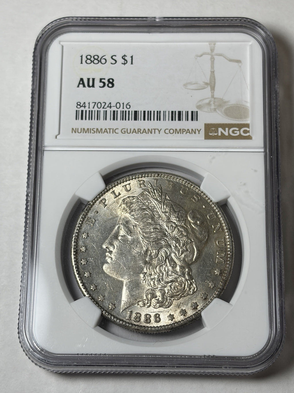 1886-S NGC AU58 Morgan Silver Dollar Toned