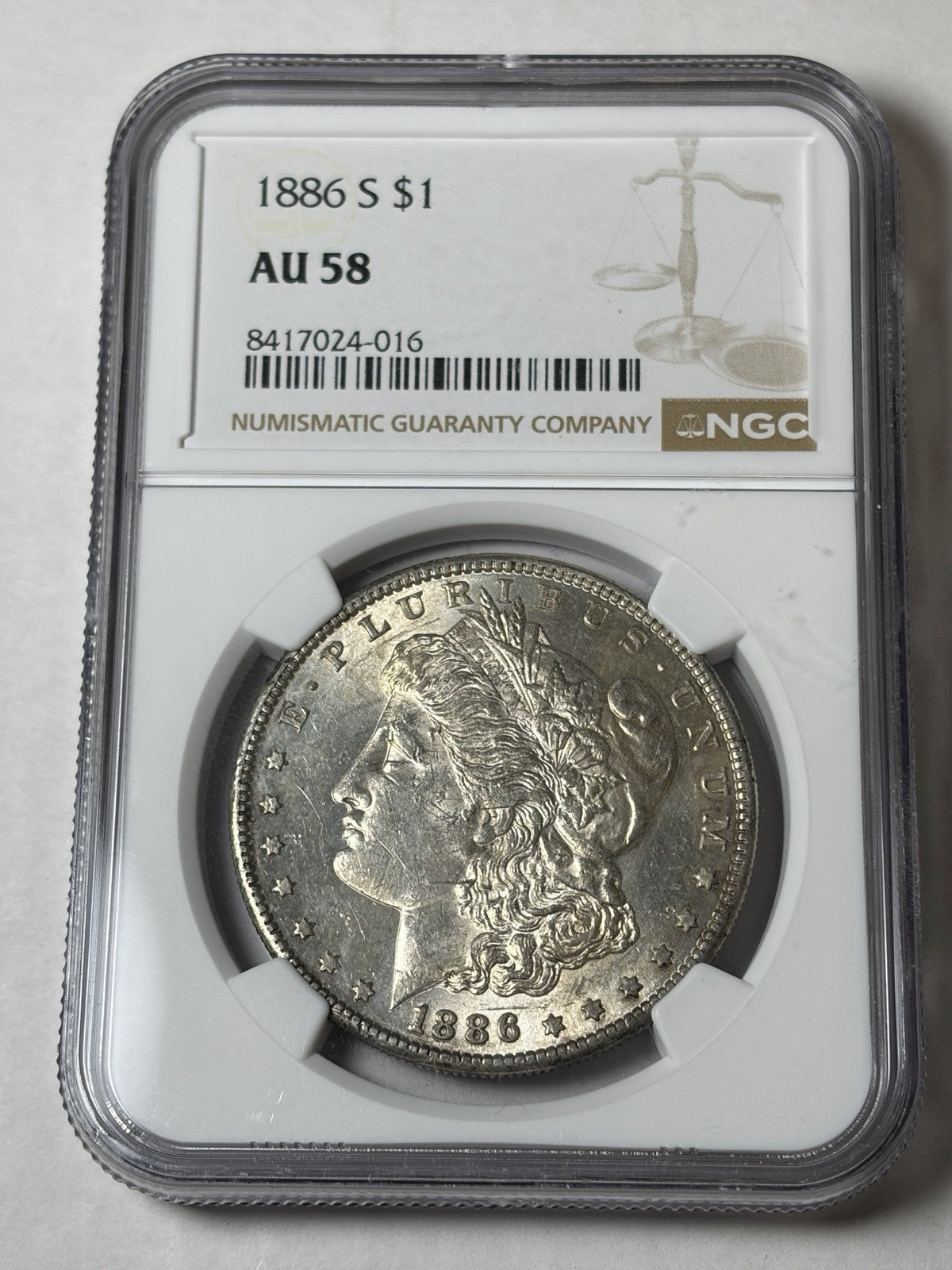 1886-S NGC AU58 Morgan Silver Dollar Toned