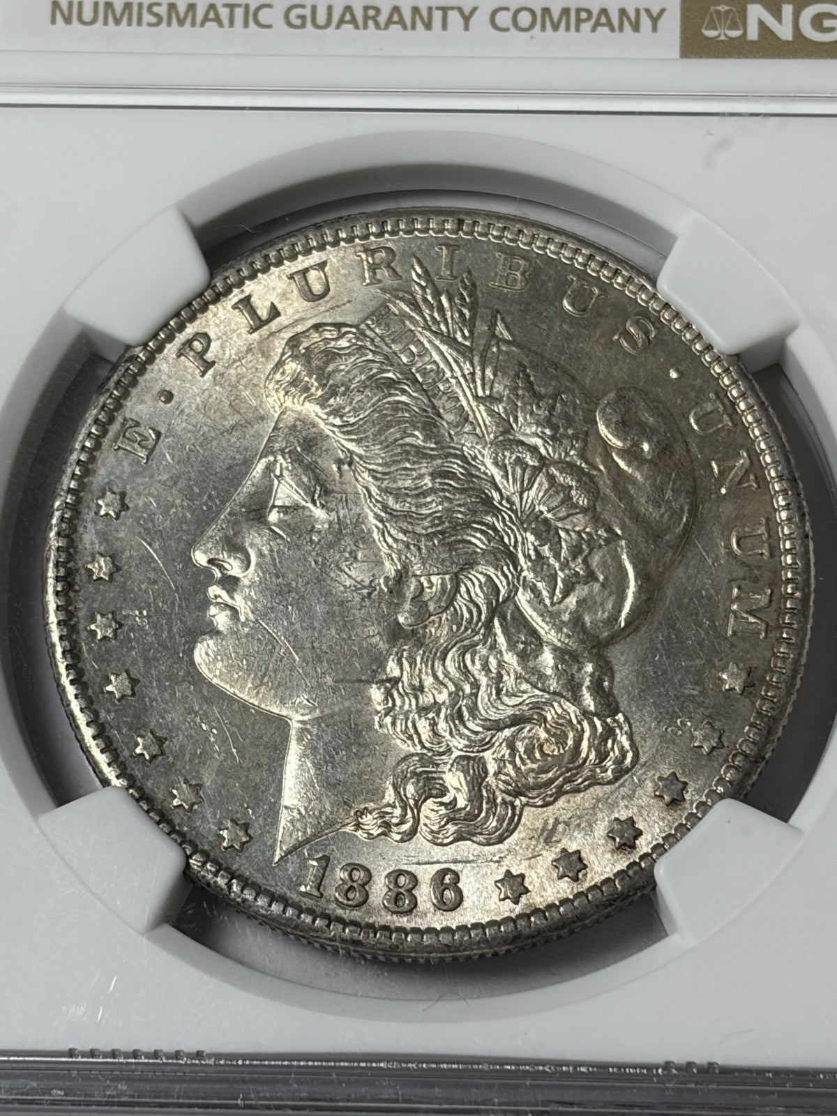 1886-S NGC AU58 Morgan Silver Dollar Toned