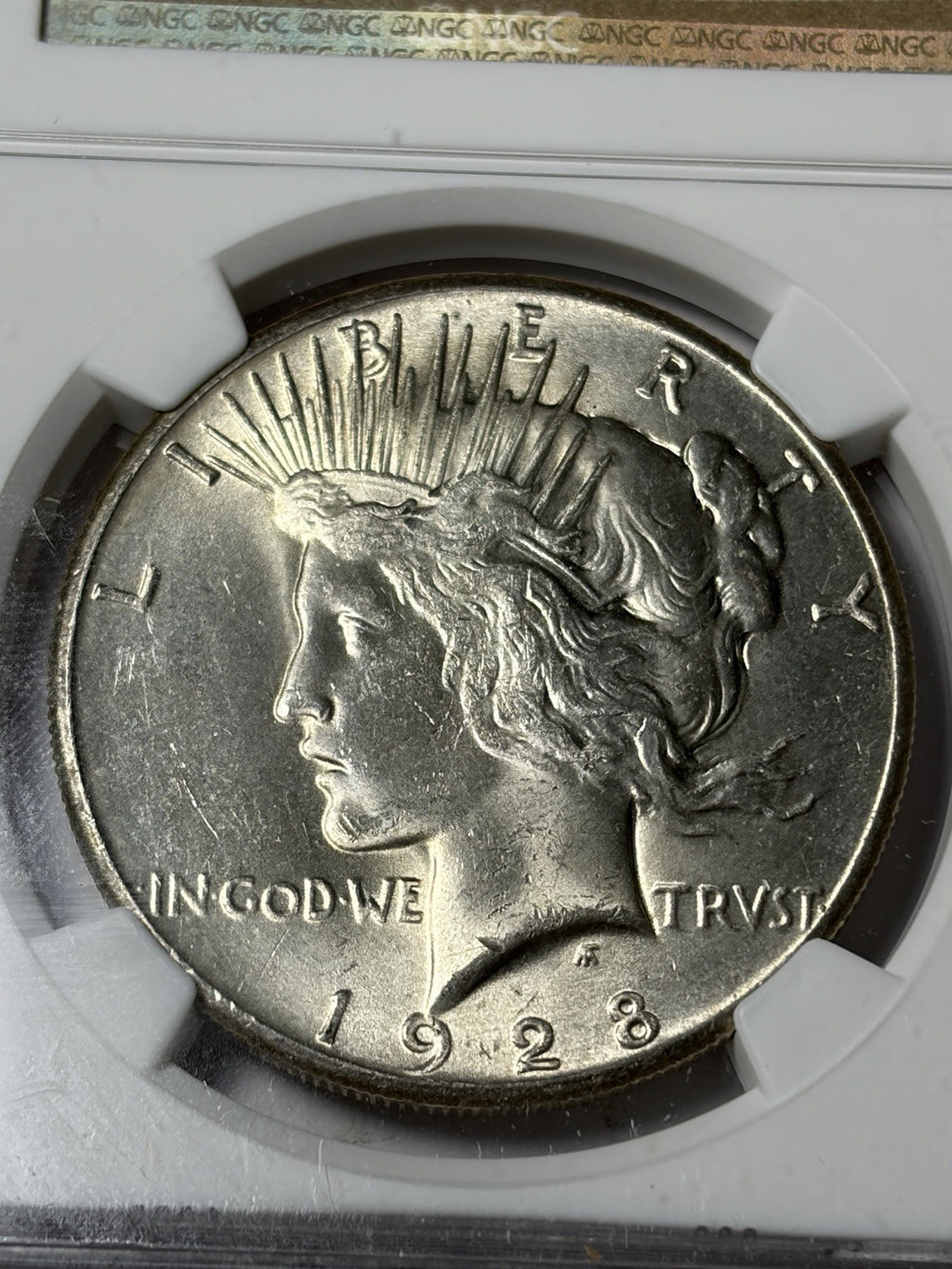 1928 NGC MS63 Peace Silver Dollar
