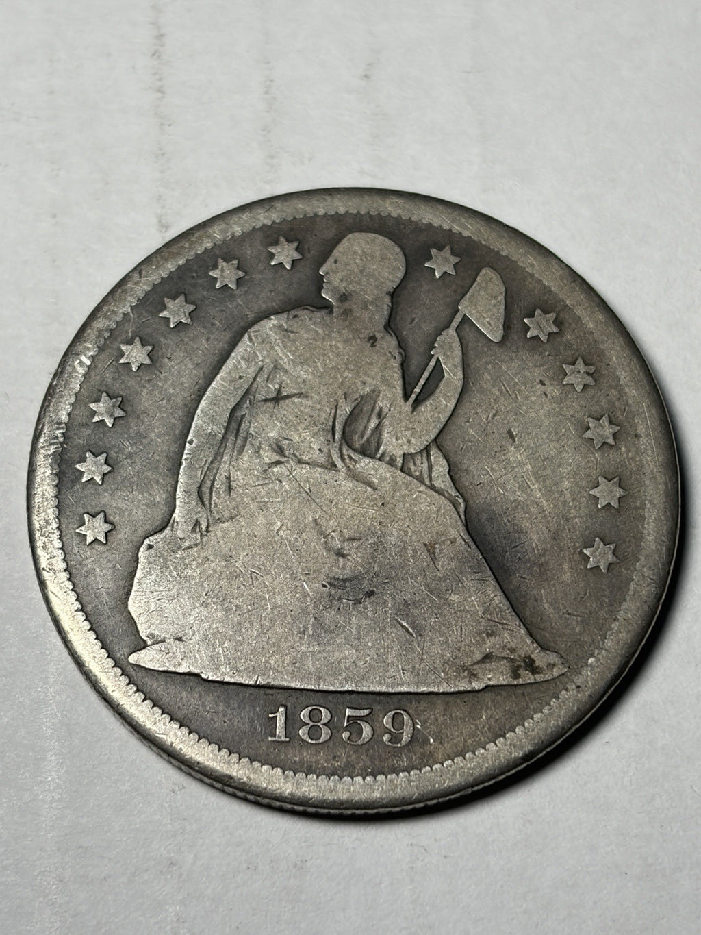 1859-O Seated Liberty Dollar